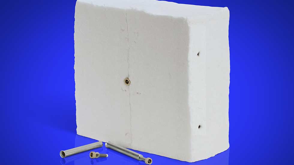 A AES – Low Bio-Persistence Wool Pyro-Block module with included hardware, pictured on a blue background.
