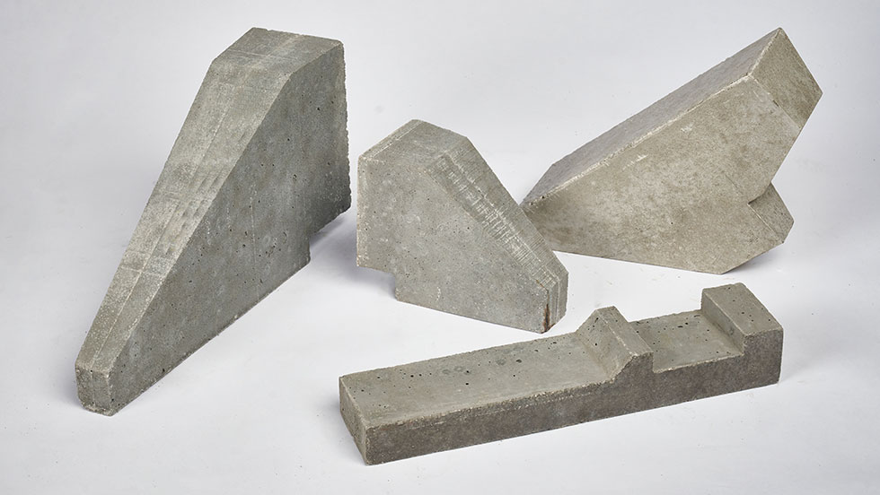 Boiler Industrial Precast Shapes A collection of four different size precast refractory shapes for high-temperature boiler applications.