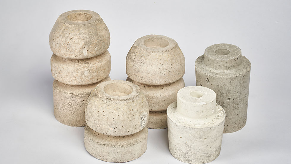 Precast Shapes Foundry Boiler No Part Numbers A collection of precast refractory shapes made from high-temperature castable refractory cement.