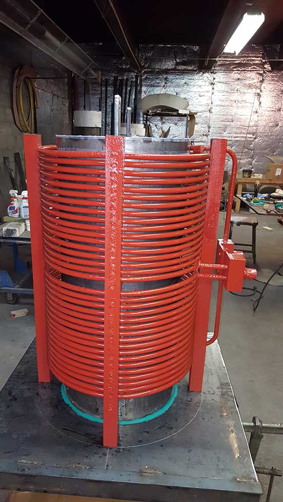 Vacuum Coil A large industrial vacuum induction coil.